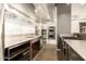 Kitchen with stainless steel counters and appliances with double ovens in the background at 914 E Osborn Rd # 202, Phoenix, AZ 85014