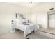 Well lit bedroom features a ceiling fan and a walk in closet at 10309 E Twilight Ct, Sun Lakes, AZ 85248