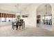 Charming dining room area with a black wood table set, perfect for enjoying meals at 10309 E Twilight Ct, Sun Lakes, AZ 85248