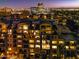 Night aerial view of building, highlighting lit windows at 17 W Vernon Ave # 316, Phoenix, AZ 85003