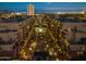 Night aerial view of building and courtyard with pool at 17 W Vernon Ave # 316, Phoenix, AZ 85003