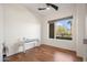 Bright bedroom with hardwood floors and large window with city views at 17 W Vernon Ave # 316, Phoenix, AZ 85003