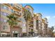 Modern apartment building with palm trees at 17 W Vernon Ave # 316, Phoenix, AZ 85003