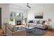 Bright living room with a modern fireplace and city views at 17 W Vernon Ave # 316, Phoenix, AZ 85003