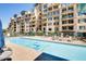 Inviting pool area with lounge chairs and lush landscaping at 17 W Vernon Ave # 316, Phoenix, AZ 85003