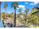 Charming street view with mature palm trees lining the street in front of picturesque homes at 17 W Vernon Ave # 316, Phoenix, AZ 85003