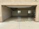 Garage with epoxy floor, workbench, and shelving at 38406 N 12Th Ave, Phoenix, AZ 85086