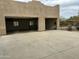 Two-car garages in a custom home, desert landscaping at 38406 N 12Th Ave, Phoenix, AZ 85086