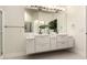 Modern bathroom featuring a double sink vanity with a large mirror and stylish fixtures at 5450 E Mclellan Rd # 204, Mesa, AZ 85205