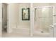 Clean, modern bathroom featuring a soaking tub and a separate glass-enclosed shower at 5450 E Mclellan Rd # 204, Mesa, AZ 85205