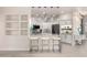 Modern kitchen with stainless steel appliances, island seating, and ample counter space at 5450 E Mclellan Rd # 204, Mesa, AZ 85205