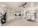 Bright, open-concept living area flows into a kitchen with modern finishes and a dining area at 5450 E Mclellan Rd # 204, Mesa, AZ 85205
