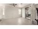 Spacious, well-lit room with a sliding glass door that leads to the outside at 5450 E Mclellan Rd # 204, Mesa, AZ 85205