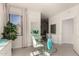 Stylish office with ample natural light, glass desk, and elegant decorative elements at 5450 E Mclellan Rd # 204, Mesa, AZ 85205