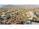 Aerial neighborhood view with surrounding mountain landscape at 6960 E Hacienda La Noria Ln, Gold Canyon, AZ 85118
