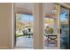 View of backyard patio and seating area with mountain backdrop at 6960 E Hacienda La Noria Ln, Gold Canyon, AZ 85118