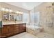 Elegant bathroom with double vanity and large shower at 6960 E Hacienda La Noria Ln, Gold Canyon, AZ 85118