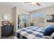 Bedroom with a blue and white checkered comforter at 6960 E Hacienda La Noria Ln, Gold Canyon, AZ 85118