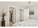 Bedroom with a closet and access to another room at 6960 E Hacienda La Noria Ln, Gold Canyon, AZ 85118