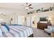 Spacious main bedroom with a sitting area and ensuite bathroom at 6960 E Hacienda La Noria Ln, Gold Canyon, AZ 85118