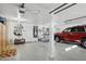 Garage with epoxy flooring and ample storage at 6960 E Hacienda La Noria Ln, Gold Canyon, AZ 85118