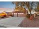 Two story house with a two car garage at 6960 E Hacienda La Noria Ln, Gold Canyon, AZ 85118