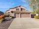 Two story house with a two car garage at 6960 E Hacienda La Noria Ln, Gold Canyon, AZ 85118