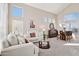 Spacious living room with large windows and high ceilings at 6960 E Hacienda La Noria Ln, Gold Canyon, AZ 85118