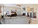 Living room with fireplace and large TV at 6960 E Hacienda La Noria Ln, Gold Canyon, AZ 85118