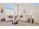 Light and airy living room with two sofas and large windows at 6960 E Hacienda La Noria Ln, Gold Canyon, AZ 85118