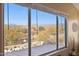 Stunning mountain views seen from a large window at 6960 E Hacienda La Noria Ln, Gold Canyon, AZ 85118