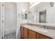 Bathroom with double vanity, granite countertop, and separate shower/tub at 9354 E Hillview Cir, Mesa, AZ 85207