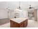 Spacious kitchen with island, stainless steel appliances, and ample cabinet space at 9354 E Hillview Cir, Mesa, AZ 85207