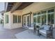 Covered patio with cushioned chairs and view of pool at 11085 E Becker E Ln, Scottsdale, AZ 85259