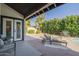 Back patio with lounge chairs and view of pool at 11085 E Becker E Ln, Scottsdale, AZ 85259