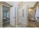 This bathroom features a tiled shower with built in bench and neutral walls at 11085 E Becker E Ln, Scottsdale, AZ 85259