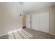This bedroom features carpeted floors, a closet with sliding doors, and neutral walls at 11085 E Becker E Ln, Scottsdale, AZ 85259