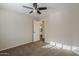This bedroom has carpeted floors and a view of the dining room at 11085 E Becker E Ln, Scottsdale, AZ 85259