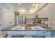Kitchen with breakfast bar, stainless steel appliances and granite countertops at 11085 E Becker E Ln, Scottsdale, AZ 85259
