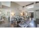 Spacious living room boasting an open floor plan, designer rug and lots of natural light at 11085 E Becker E Ln, Scottsdale, AZ 85259