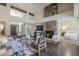 Inviting living room featuring a fireplace, high ceilings, and an open layout at 11085 E Becker E Ln, Scottsdale, AZ 85259