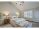 Bright main bedroom featuring a plush bed, ceiling fan, plantation shutters, and serene decor for a relaxing ambiance at 11085 E Becker E Ln, Scottsdale, AZ 85259