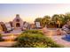 Relaxing backyard patio with fire pit, seating area, and mountain views at 13141 E Cibola Rd, Scottsdale, AZ 85259