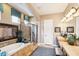 Elegant bathroom with double vanity, soaking tub, and walk-in shower at 28368 N 129Th Dr, Peoria, AZ 85383