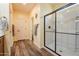 Bathroom with walk-in shower and neutral color scheme at 40076 W Ganly Way, Maricopa, AZ 85138