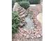 Relaxing water feature with waterfall and pond landscaping at 4680 E Blue Spruce Ln, Gilbert, AZ 85298