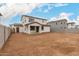 Spacious backyard view showcasing the home's exterior and patio at 4924 W Beryl Ave, Glendale, AZ 85302