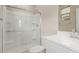 This bathroom features a shower with glass doors and a vanity with white countertops at 4924 W Beryl Ave, Glendale, AZ 85302