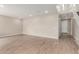 Spacious living room featuring recessed lighting, wood-look tile flooring, and neutral paint, offering a bright atmosphere at 4924 W Beryl Ave, Glendale, AZ 85302