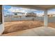 Large backyard under construction with privacy wall and covered patio at 4925 W Beryl Ave, Glendale, AZ 85302